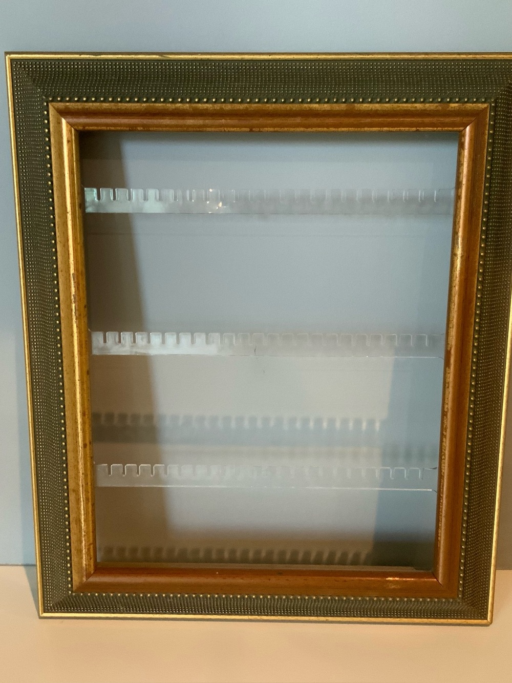 Vintage Earring holder framed in goldtone